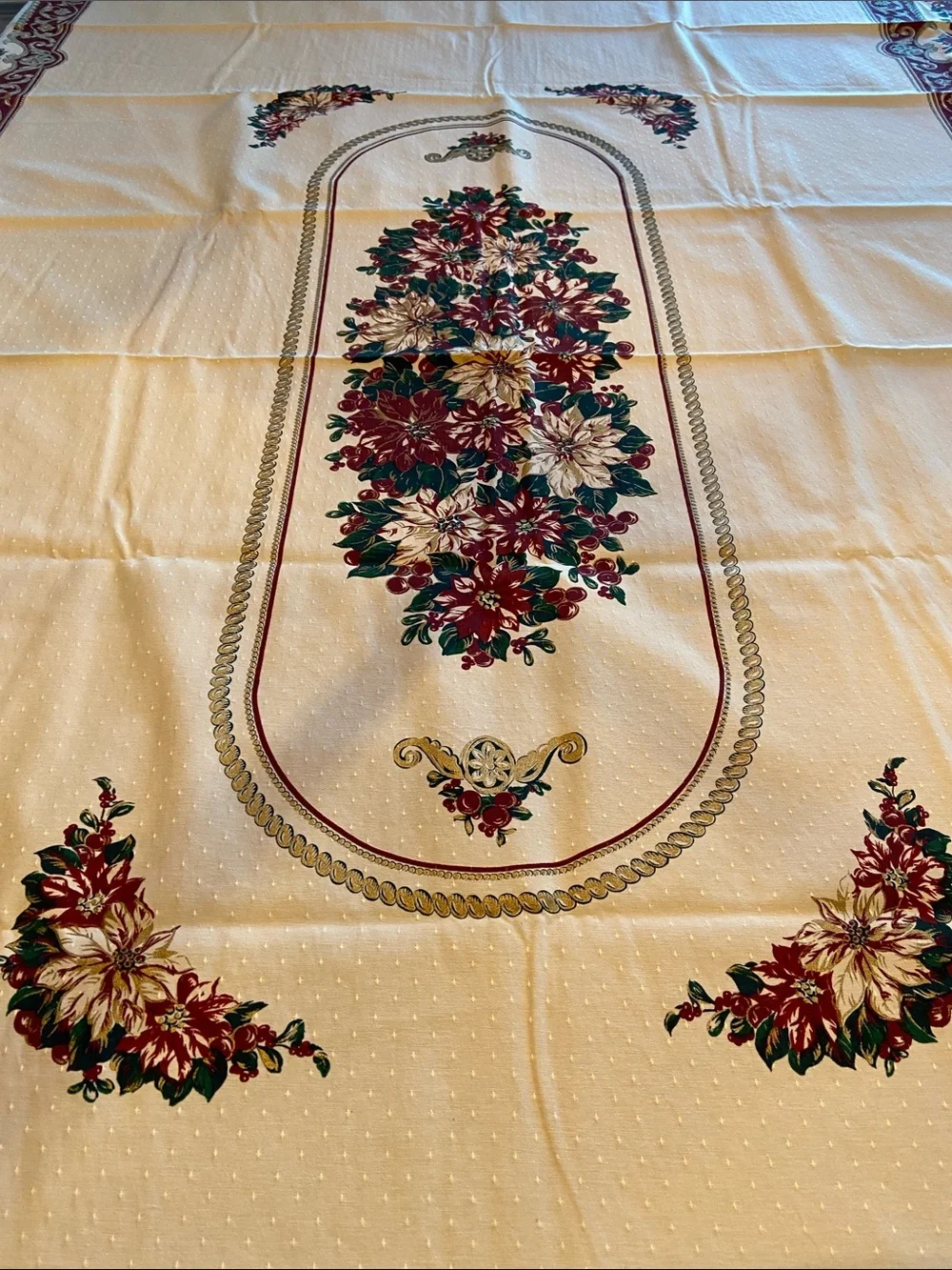 Cream Floral Border Tablecloth with Wine Colored Accents.  Cotton/ Poly Blend.